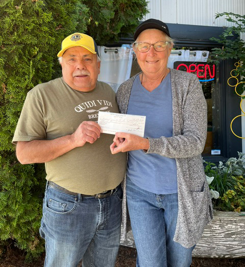 $5000 Donation to Garden Club President of the Enderby & District Lions club Joe Deveau presenting a cheque for $5,000. dollars to Darlene Folk Treasurer of the Enderby Community Garden Society